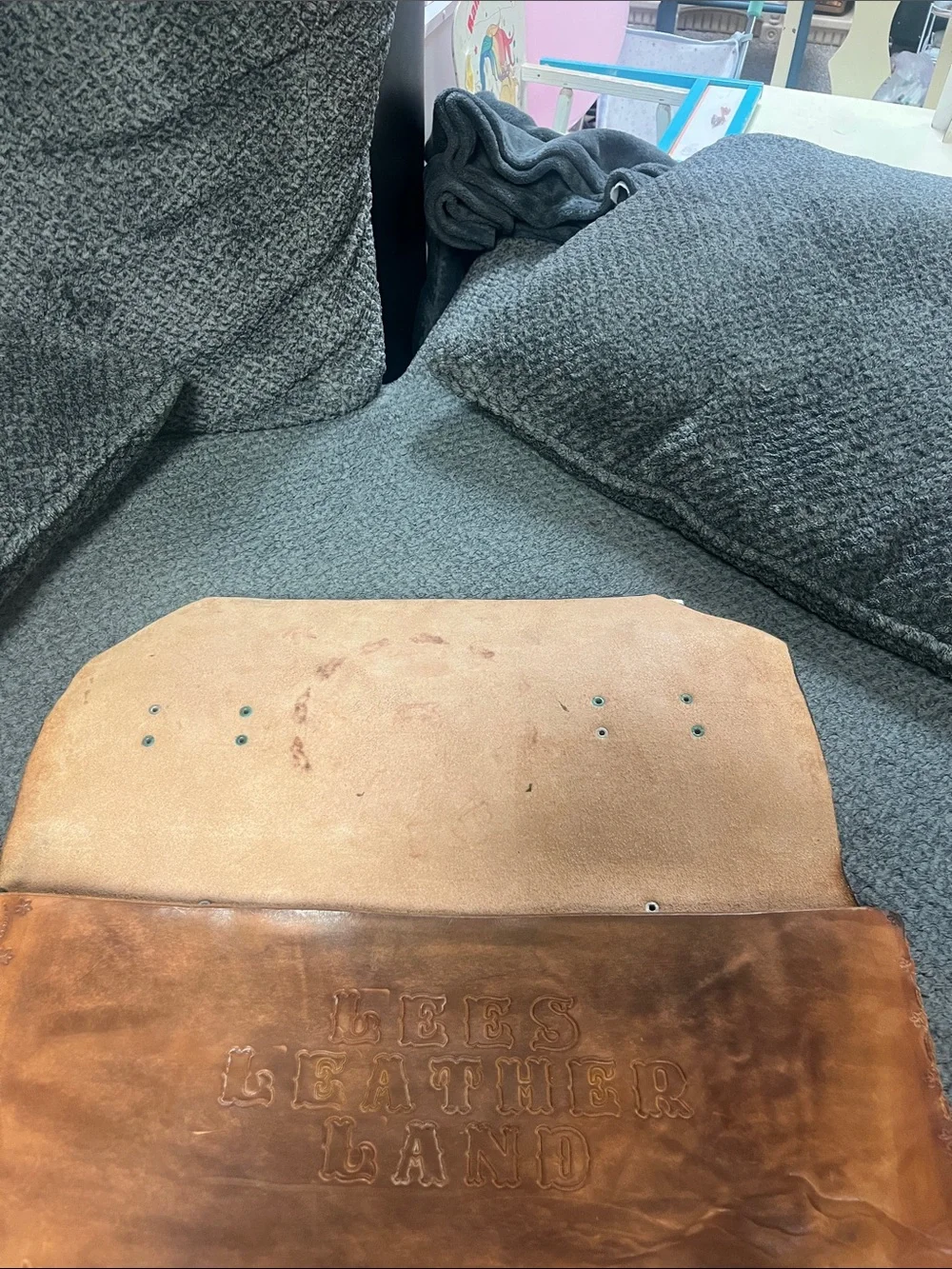 Hand-Tooled Tan Leather Briefcase with Embossed Motifs